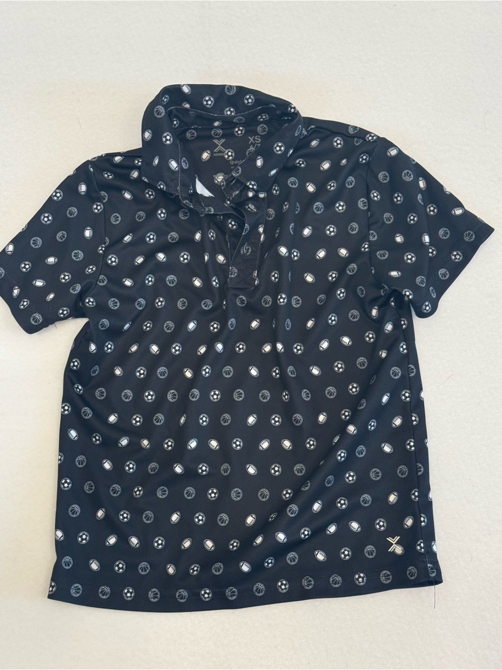 Xersion Navy Polo with White Dot Motif